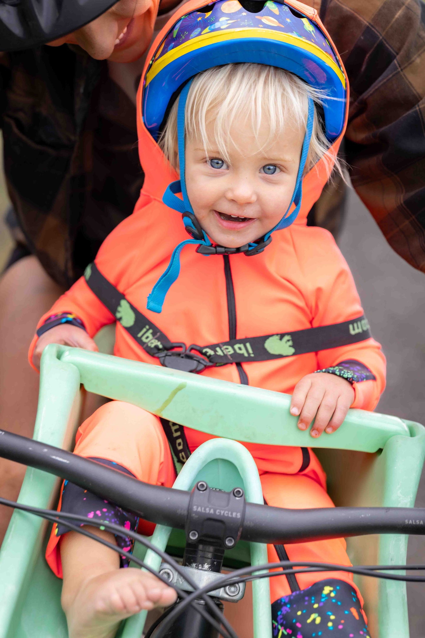 Child with Sunsie on bike